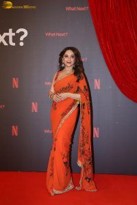 actress madhuri dixit beautiful in a orange red saree