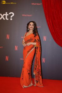 actress madhuri dixit beautiful in a orange red saree