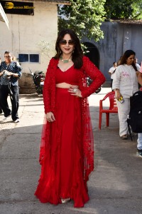 bollywood actress Madhuri Dixit hot looks in a red dress on the sets of dance deewane