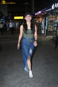 actress mahima makwana gorgeous in a green top and a slit midi skirt at airport