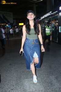actress mahima makwana gorgeous in a green top and a slit midi skirt at airport