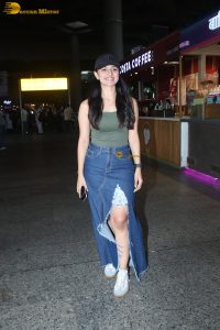 actress mahima makwana gorgeous in a green top and a slit midi skirt at airport
