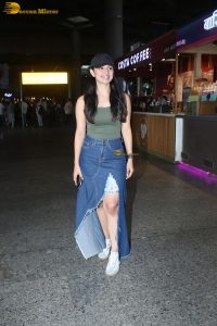 actress mahima makwana gorgeous in a green top and a slit midi skirt at airport