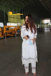 Malaika Arora dressed in white seen at the Mumbai Airport