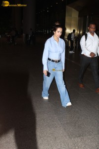 actress Malaika Arora stylish look in a blue shirt and denim jeans