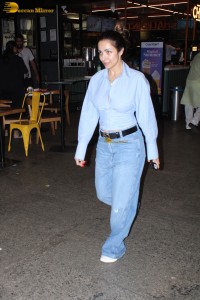 actress Malaika Arora stylish look in a blue shirt and denim jeans