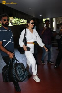 actress malaika arora in a white track suit at airport