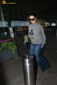 actress Malaika Arora chic look in t-shirt and jeans at mumbai airport