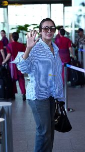 actress malaika arora chic look in a shirt and sunglasses