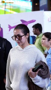 actress malaika arora stylish in a sweatshirt and sunglasses at mumbai airport