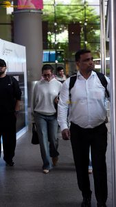 actress malaika arora stylish in a sweatshirt and sunglasses at mumbai airport