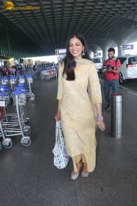 actress malavika mohanan pretty looks in a yellow salwar