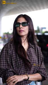 actress malavika mohanan stylish and stunning in sunglasses and jacket