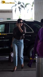 actress malavika mohanan stylish and stunning in sunglasses and jacket