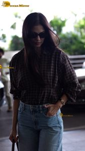 actress malavika mohanan stylish and stunning in sunglasses and jacket