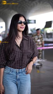 actress malavika mohanan stylish and stunning in sunglasses and jacket