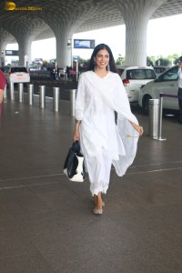 actress malavika mohanan pretty in a white salwar at airport