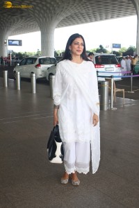 actress malavika mohanan pretty in a white salwar at airport