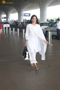 actress malavika mohanan pretty in a white salwar at airport