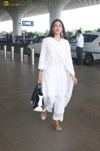 actress malavika mohanan pretty in a white salwar at airport