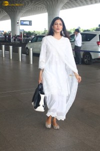 actress malavika mohanan pretty in a white salwar at airport