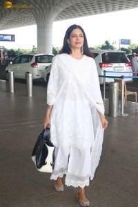 actress malavika mohanan pretty in a white salwar at airport