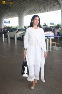 actress malavika mohanan pretty in a white salwar at airport