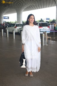 actress malavika mohanan pretty in a white salwar at airport