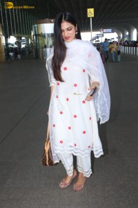 actress Malavika Mohanan shines in a white salwar dress