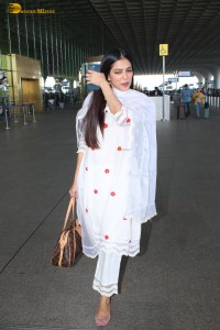actress Malavika Mohanan shines in a white salwar dress