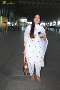 actress Malavika Mohanan shines in a white salwar dress