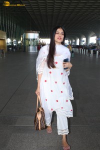 actress Malavika Mohanan shines in a white salwar dress