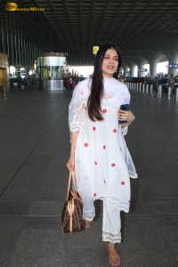 actress Malavika Mohanan shines in a white salwar dress