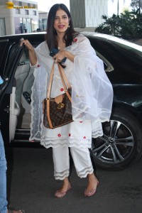 actress Malavika Mohanan shines in a white salwar dress