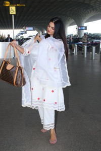actress Malavika Mohanan shines in a white salwar dress