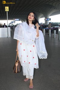 actress Malavika Mohanan shines in a white salwar dress