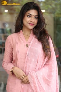 Actress Malavika Satheesan photoshoot in a pink dress
