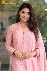 Actress Malavika Satheesan photoshoot in a pink dress