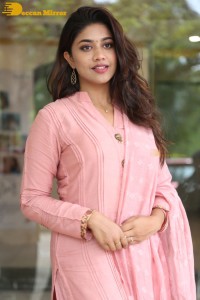 Actress Malavika Satheesan photoshoot in a pink dress