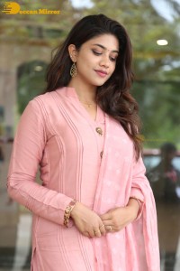 Actress Malavika Satheesan photoshoot in a pink dress