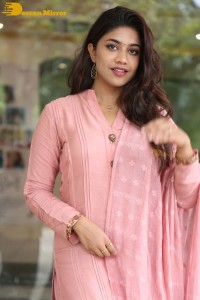 Actress Malavika Satheesan photoshoot in a pink dress