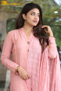 Actress Malavika Satheesan photoshoot in a pink dress