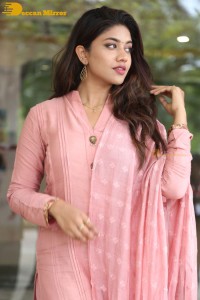 Actress Malavika Satheesan photoshoot in a pink dress