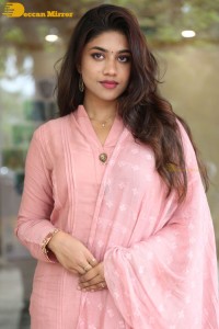 Actress Malavika Satheesan photoshoot in a pink dress