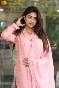 Actress Malavika Satheesan photoshoot in a pink dress