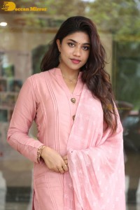 Actress Malavika Satheesan photoshoot in a pink dress