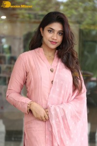 Actress Malavika Satheesan photoshoot in a pink dress