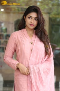 Actress Malavika Satheesan photoshoot in a pink dress
