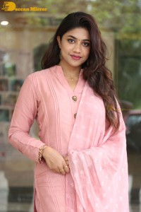 Actress Malavika Satheesan photoshoot in a pink dress