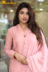 Actress Malavika Satheesan photoshoot in a pink dress